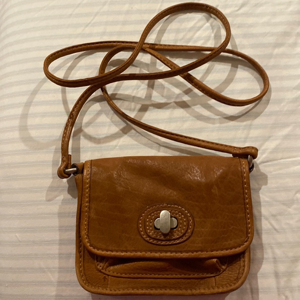 Small, leather, Fossil brand crossbody bag.